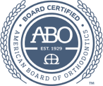 American Board of Orthodontics (ABO) circular logo featuring a circular design